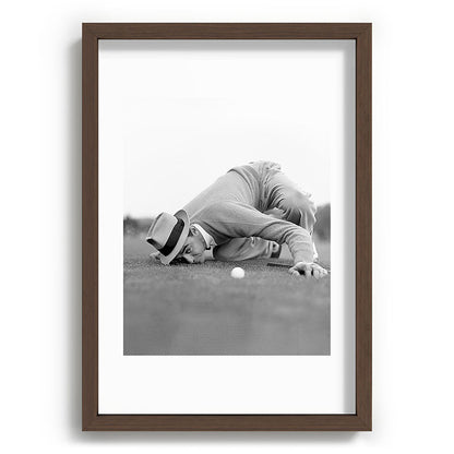 Eye to the ground on the 18th hole; golfing man eyes ball to measure distance to hole vintage black and white portrait photograph - photography - photographs poster Framed Art Print Gallery Image 89