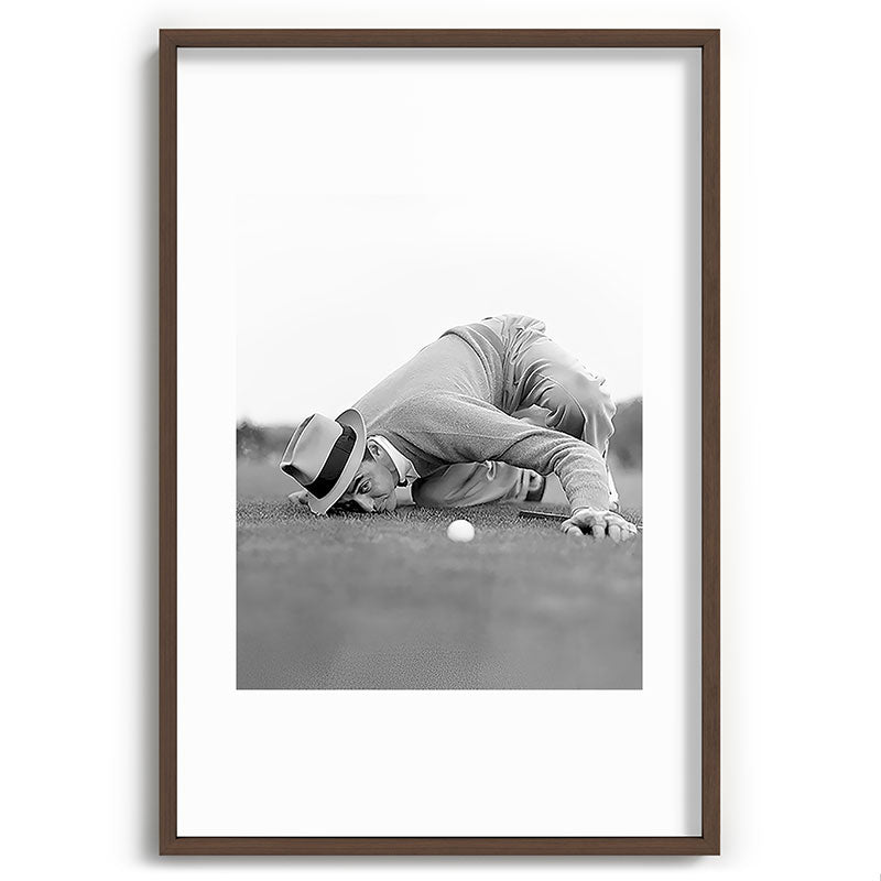 Eye to the ground on the 18th hole; golfing man eyes ball to measure distance to hole vintage black and white portrait photograph - photography - photographs poster Framed Art Print Gallery Image 94