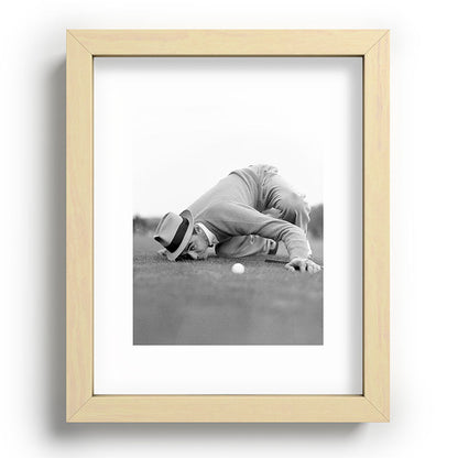 Eye to the ground on the 18th hole; golfing man eyes ball to measure distance to hole vintage black and white portrait photograph - photography - photographs poster Framed Art Print Gallery Image 95