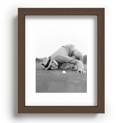 Eye to the ground on the 18th hole; golfing man eyes ball to measure distance to hole vintage black and white portrait photograph - photography - photographs poster Framed Art Print Gallery Image 86