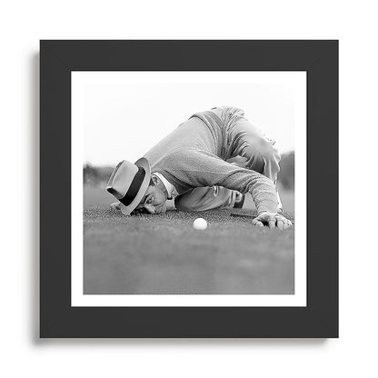 Eye to the ground on the 18th hole; golfing man eyes ball to measure distance to hole vintage black and white portrait photograph - photography - photographs poster Framed Art Print Gallery Image 46