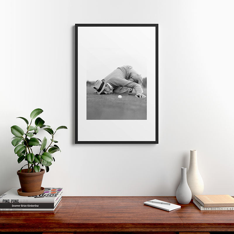 Eye to the ground on the 18th hole; golfing man eyes ball to measure distance to hole vintage black and white portrait photograph - photography - photographs poster Framed Art Print Gallery Image 8
