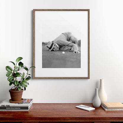 Eye to the ground on the 18th hole; golfing man eyes ball to measure distance to hole vintage black and white portrait photograph - photography - photographs poster Framed Art Print Gallery Image 19