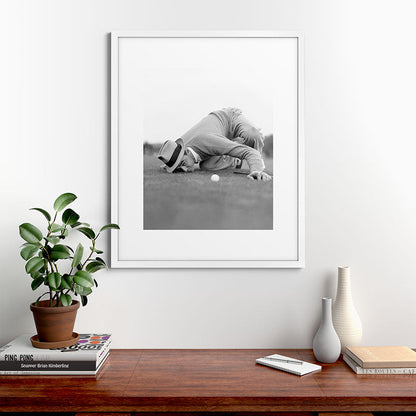 Eye to the ground on the 18th hole; golfing man eyes ball to measure distance to hole vintage black and white portrait photograph - photography - photographs poster Framed Art Print Gallery Image 76