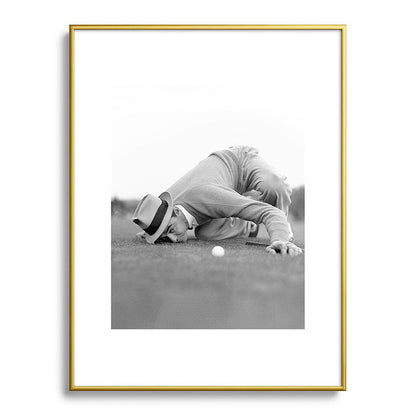 Eye to the ground on the 18th hole; golfing man eyes ball to measure distance to hole vintage black and white portrait photograph - photography - photographs poster Framed Art Print Gallery Image 125