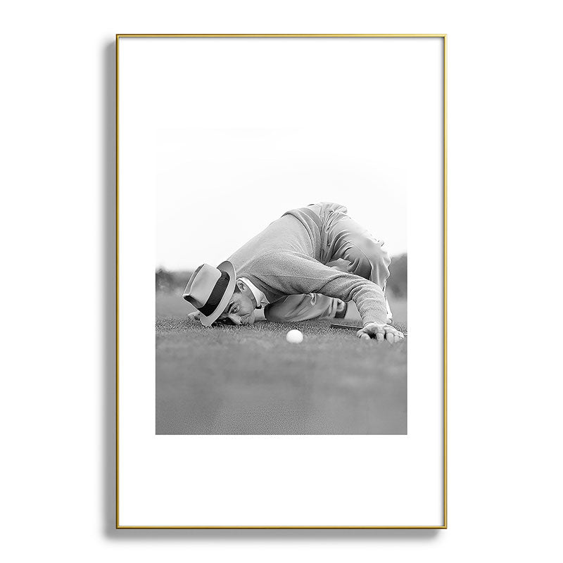 Eye to the ground on the 18th hole; golfing man eyes ball to measure distance to hole vintage black and white portrait photograph - photography - photographs poster Framed Art Print Gallery Image 127