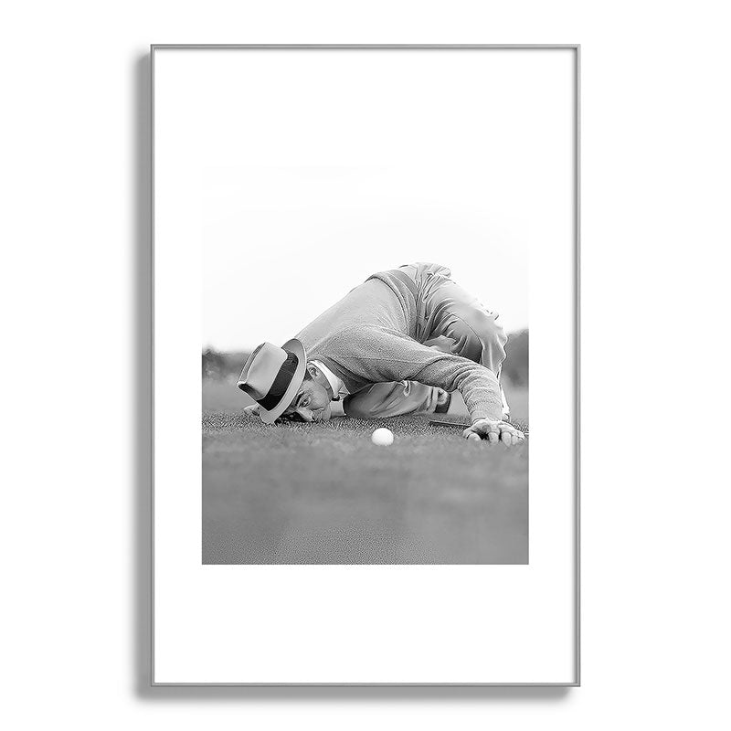 Eye to the ground on the 18th hole; golfing man eyes ball to measure distance to hole vintage black and white portrait photograph - photography - photographs poster Framed Art Print Gallery Image 138