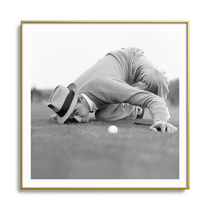 Eye to the ground on the 18th hole; golfing man eyes ball to measure distance to hole vintage black and white portrait photograph - photography - photographs poster Framed Art Print Gallery Image 136