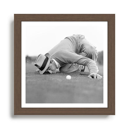 Eye to the ground on the 18th hole; golfing man eyes ball to measure distance to hole vintage black and white portrait photograph - photography - photographs poster Framed Art Print Gallery Image 13