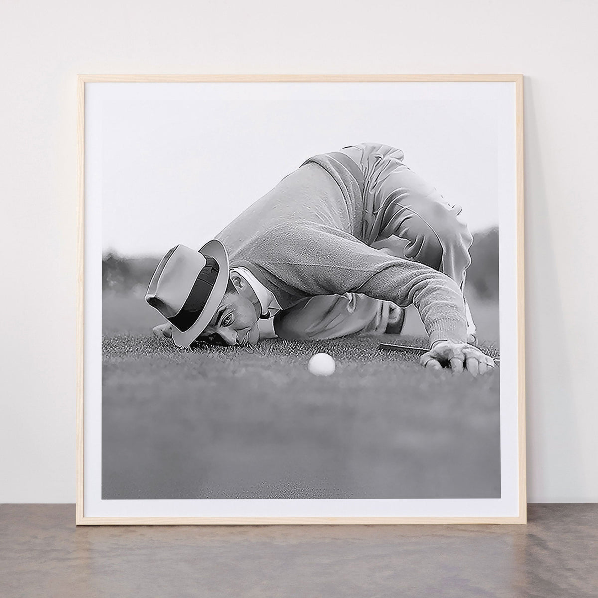Eye to the ground on the 18th hole; golfing man eyes ball to measure distance to hole vintage black and white portrait photograph - photography - photographs poster Framed Art Print Gallery Image 33