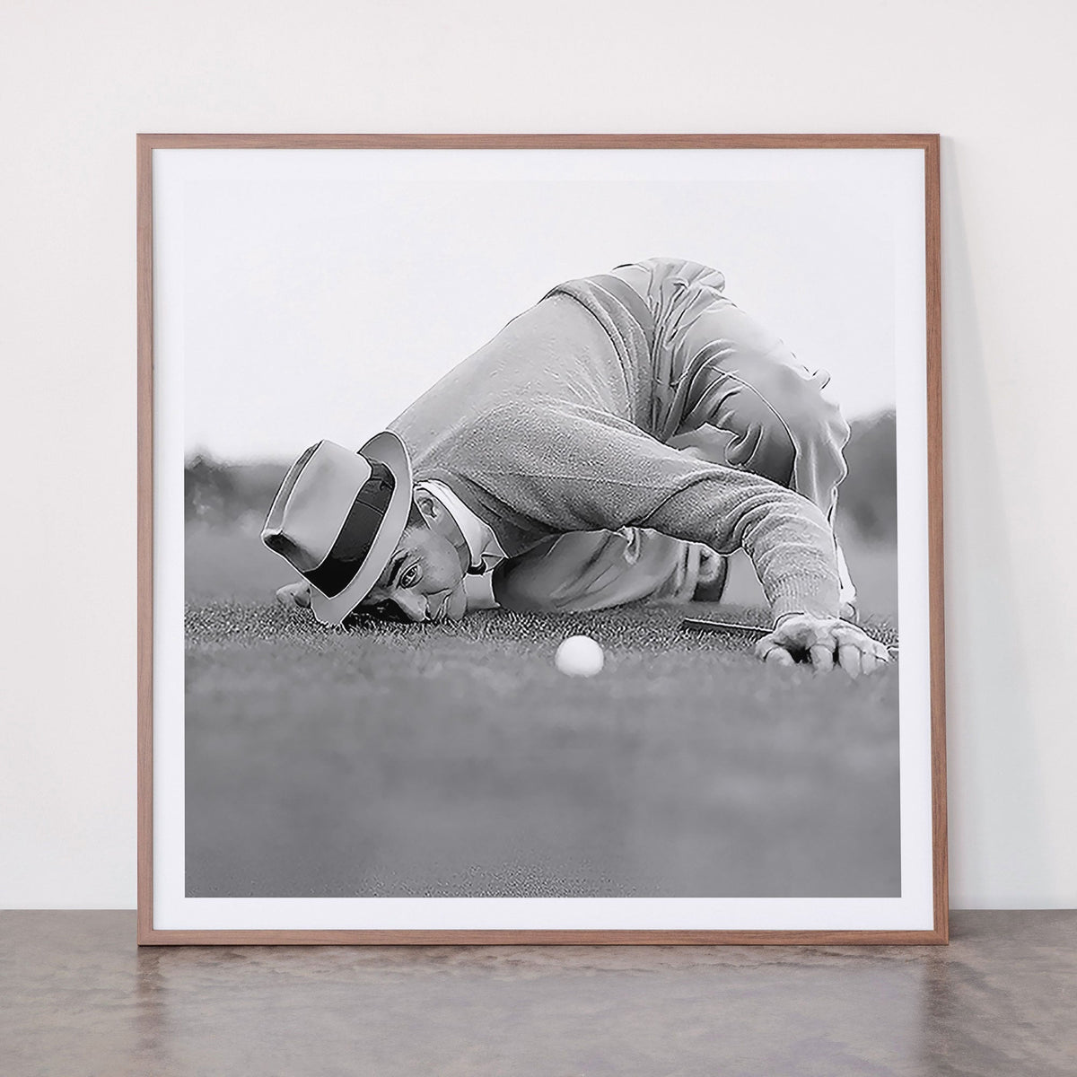 Eye to the ground on the 18th hole; golfing man eyes ball to measure distance to hole vintage black and white portrait photograph - photography - photographs poster Framed Art Print Gallery Image 21