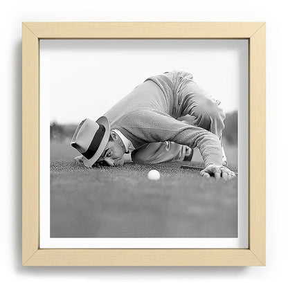 Eye to the ground on the 18th hole; golfing man eyes ball to measure distance to hole vintage black and white portrait photograph - photography - photographs poster Framed Art Print Gallery Image 106