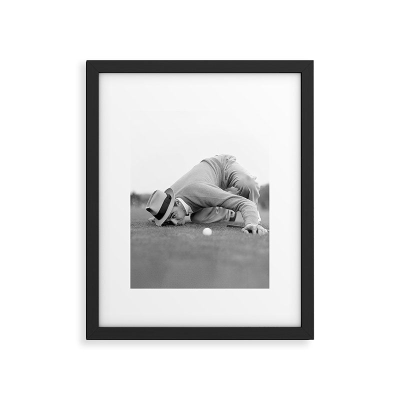 Eye to the ground on the 18th hole; golfing man eyes ball to measure distance to hole vintage black and white portrait photograph - photography - photographs poster Framed Art Print Gallery Image 3