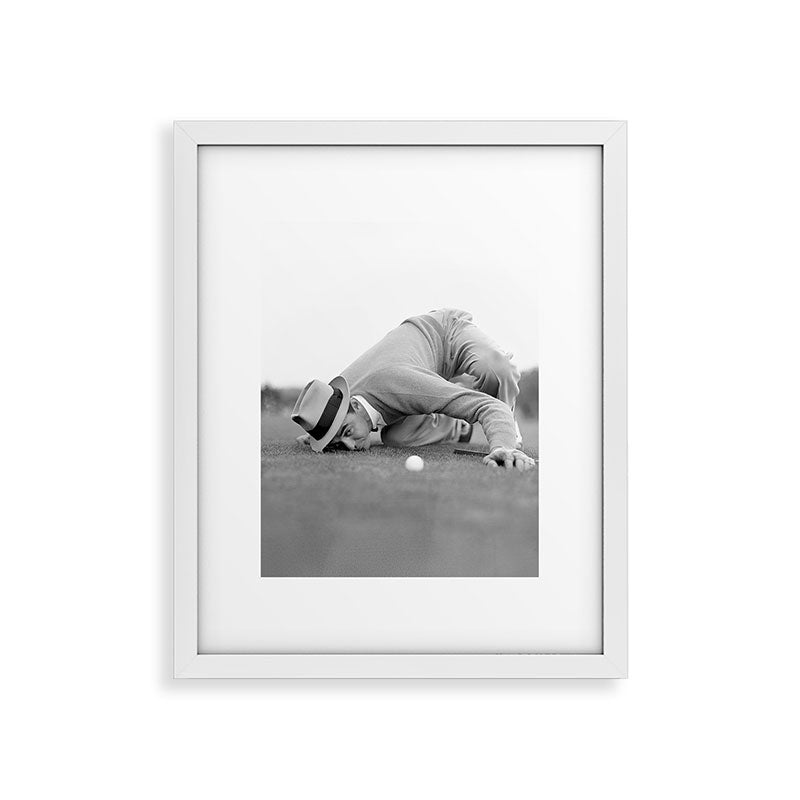 Eye to the ground on the 18th hole; golfing man eyes ball to measure distance to hole vintage black and white portrait photograph - photography - photographs poster Framed Art Print Gallery Image 30